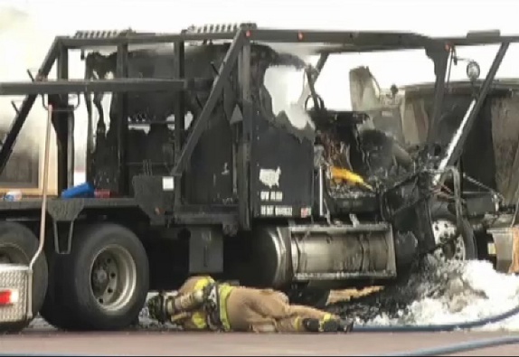 Car hauler catches fire  